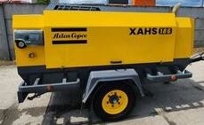Compressore portatile compatto e potente XAHS186E+ con pressione nominale di lavoro di 13 bar